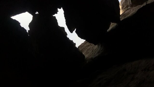 Sky views and dangerous places through the wild and mystical cave