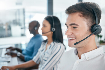 Call center, customer service and happy consultant team at crm or telemarketing office. Man and...