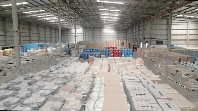 Aerial vertical tracking shot of Goods warehouse interior in Mumbai india