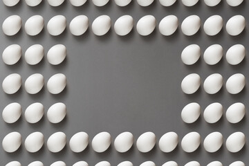 Eggs flat lay on grey background