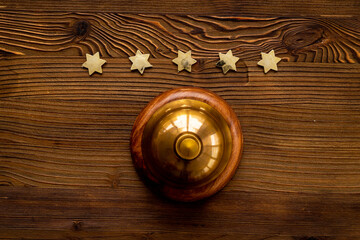 Vintage golden hotel service bell with five stars
