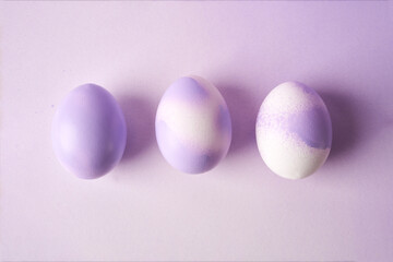 easter decoration in lilac tone, three eggs