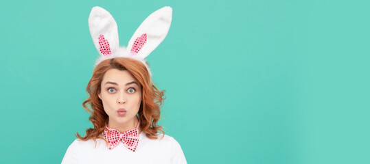 Woman isolated face portrait, banner with mock up copyspace. shocked girl in easter bunny ears with...