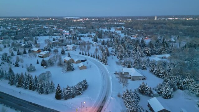 Aerial View Of Snow Covered Houses On Hemlock Ln In Dayton MN At Blue Hour
