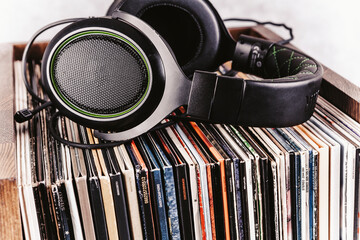 Vinyl records and headphones in retro style - 569514424