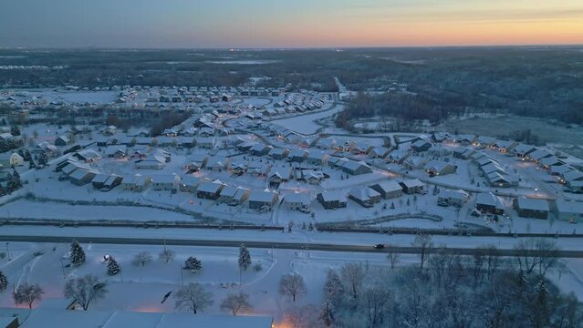 Aerial View Of Snow Covered Houses On Pineridge Way In Dayton MN At Dusk