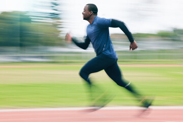 Fototapeta premium Black man, running and athletics for sports training, cross fit or exercise on stadium track in the outdoors. African American male runner athlete in fitness, sport or run for practice workout