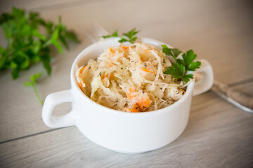 sauerkraut with carrots and spices in a bowl