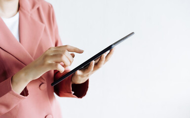 woman using tablet in office