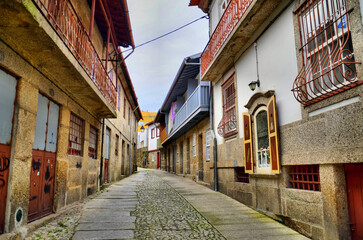 Old street in the heart of the tradition of tanning and beating hides in Guimaraes, Portugal