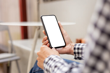 cell phone blank white screen mockup.hand holding texting using mobile on desk at office.background empty space for advertise.work people contact marketing business,technology