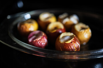 Homemade baked apples in the oven.