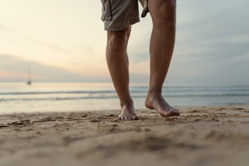  mens footsteps on the beach