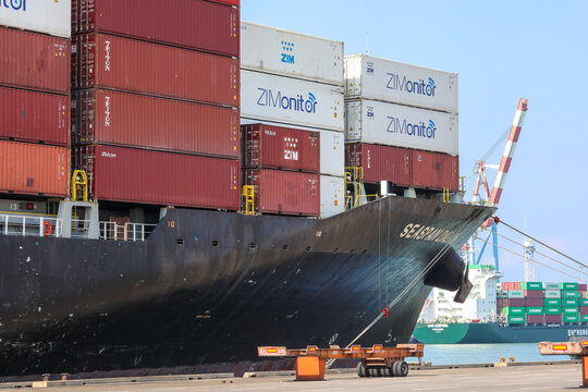 Shipping port of Haifa, Israel - October 25, 2021: ZIM Shipping Company logo on a shipping container.
