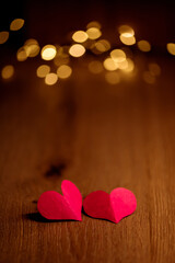 Obraz premium red heart on a background of golden bokeh