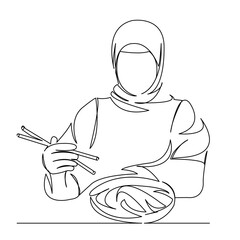 muslim girl eating food with chinese chopsticks