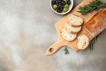 bread ciabatta and olives. banner, menu, recipe place for text, top view