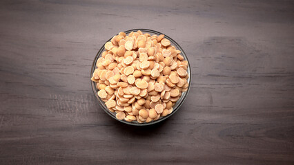 Arhar or Toor dal or Split Pigeon Pea or Yellow lentils or Pulses, top view, India
