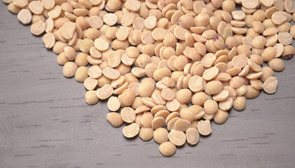 Arhar or Toor dal or Split Pigeon Pea or Yellow lentils or Pulses, top view, India