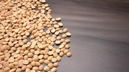 Arhar or Toor dal or Split Pigeon Pea or Yellow lentils or Pulses, top view, India