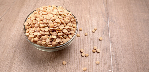 Arhar or Toor dal or Split Pigeon Pea or Yellow lentils or Pulses, top view, India