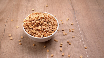 Arhar or Toor dal or Split Pigeon Pea or Yellow lentils or Pulses, top view, India