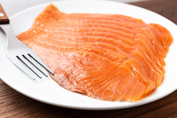 Sliced ​​smoked salmon tender and fragrant