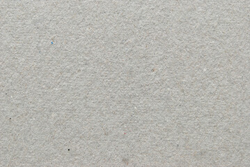 Gray recycled rough paper texture or pattern as background
