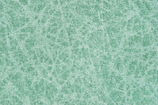 Green color cotton fabric texture as background