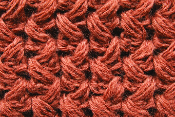 Soft brown ornamental knit surface texture as background