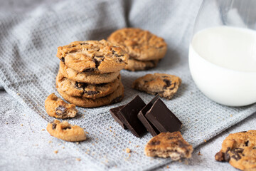 Cookies with pieces of chocolate. On a gray background
