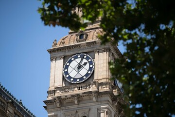 crowds watching a female Professional athlete Tennis player playing on a court in a tennis tournament in summer in australia