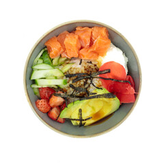 Poke with salmon, avocado, brown rice and strawberries. Isolate on a white background, top view