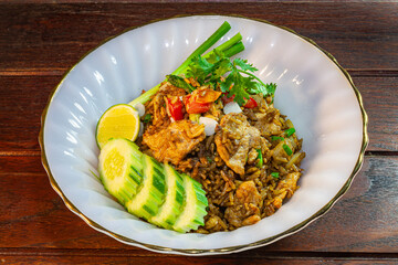 Thai railway fried rice on a white plate.