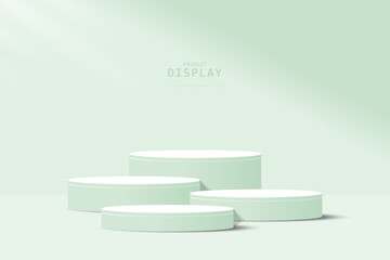 Abstract green 3D room with set of realistic green and white cylinder pedestal podium. Minimal scene for product display presentation. Geometric forms design. Round stage for show product or cosmetic.