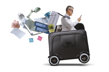 Businessman riding a briefcase with wheels