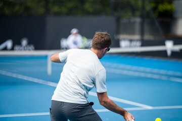 female Professional athlete Tennis player playing on a court in a tennis tournament in summer in australia