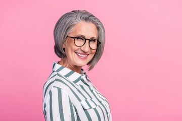 Profile photo of satisfied charming grey hair senior hr manager woman smiling enjoy recruiting more specialists isolated on pink color background