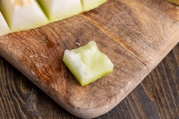 Ripe sweet melon pulp divided into small pieces