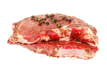 A piece of red meat on a white background.