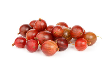 A bunch of red gooseberries scattered on a white background, close-up.