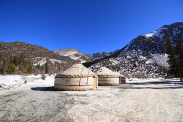 Kyrgyz yurt on a sunny winter day in the Tien Shan mountains.
