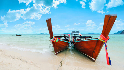 Fototapeta na wymiar Thai boats moored on Koh Ngai island near Koh Lanta, Thailand