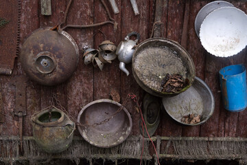 Obraz na płótnie Canvas old, iron houseware, pan, pottery, building repair materials.turkey