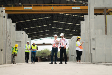 Architects a visit to the construction site. Ready to talk the progress of construction projects in the construction area with construction supervision engineers.