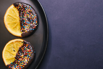 Lemon dipped in chocolate. New Year's Lemon dessert