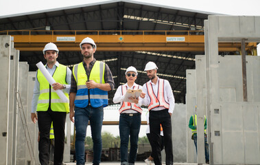 Architects a visit to the construction site. Ready to talk the progress of construction projects in the construction area with construction supervision engineers.