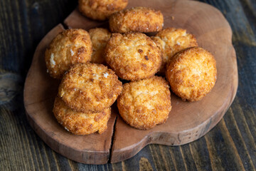 Delicious cookies with coconut on the table