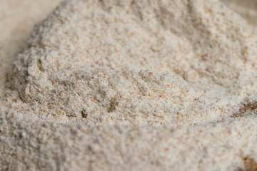 Fototapeta na wymiar Wheat flour with bran for cooking bread