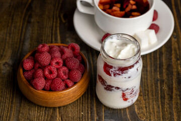 Fresh milk yogurt with whole fresh raspberries